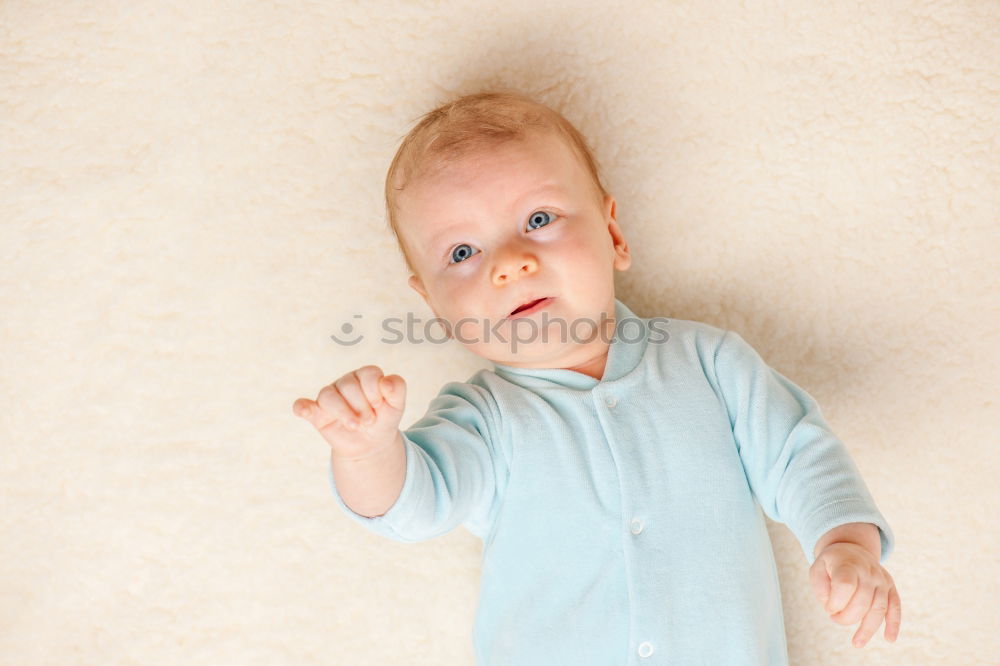 Similar – Cute Baby Girl Lying in the Crib