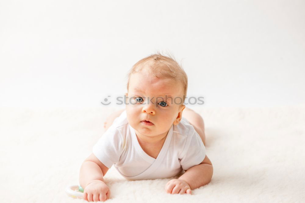 Similar – Cute Baby Girl Lying in the Crib