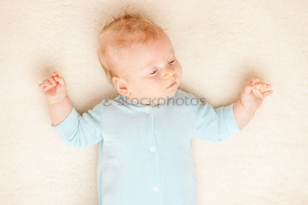 Similar – cute happy baby boy awake in his bed in the morning