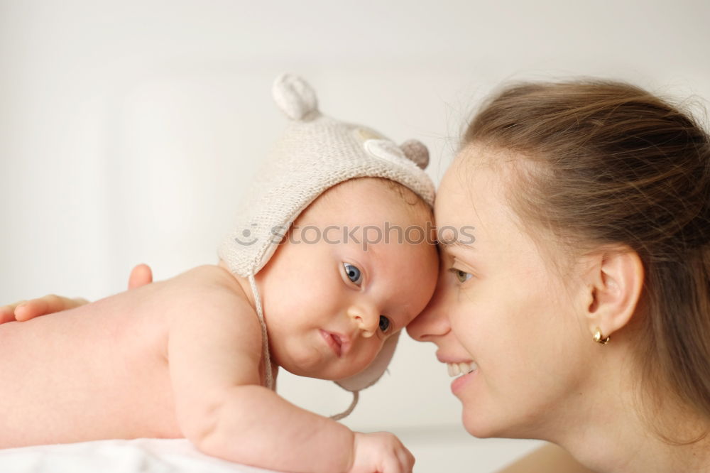 Similar – Father holding newborn baby son at the day time. Concept of happy family.