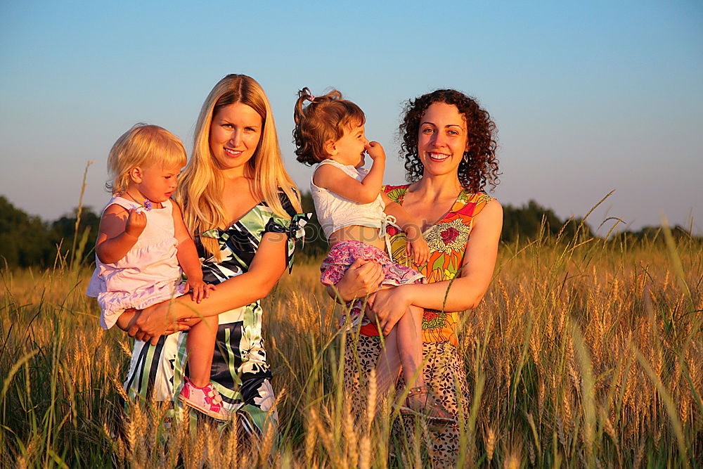 Similar – Image, Stock Photo Happy lesbian couple with child