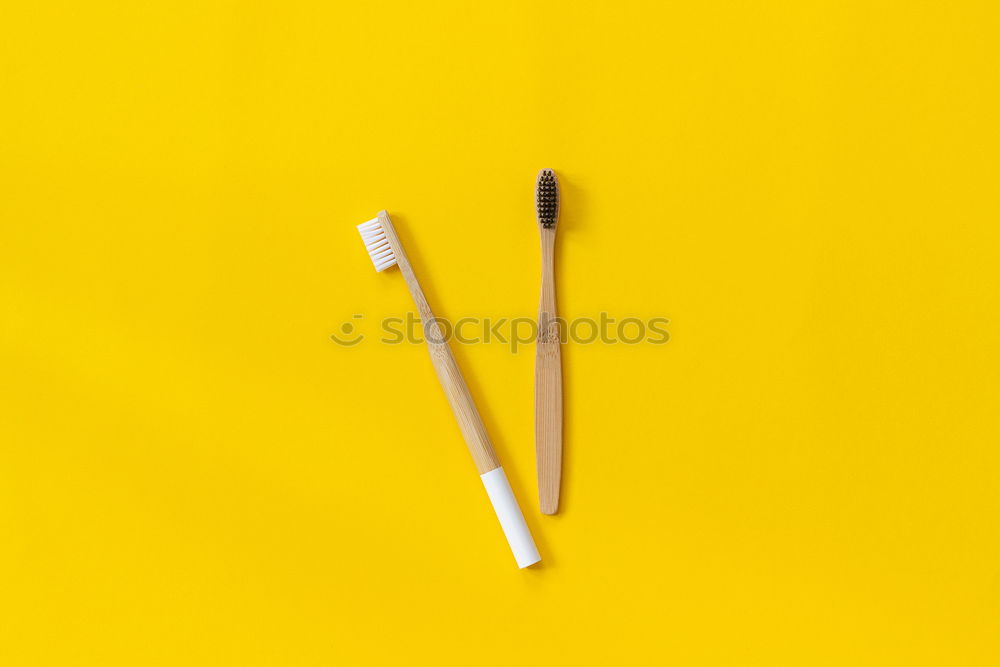 Similar – Image, Stock Photo Forearm and hand with pencil against a yellow background