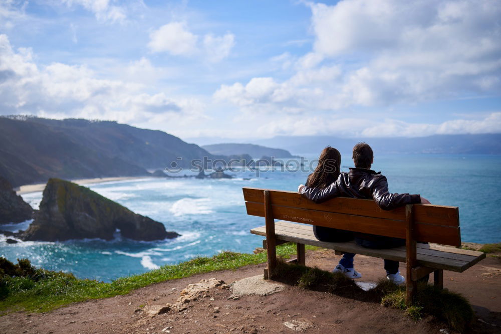 Similar – Image, Stock Photo A couple kissing in “the best bench in the world”