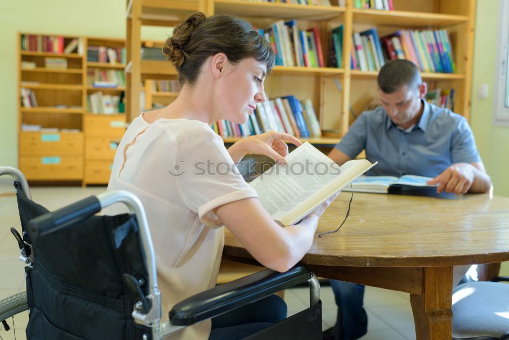 Similar – Image, Stock Photo Couple doing trekking sitting looking mobile and map
