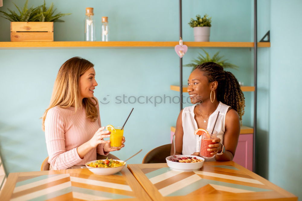 Similar – Image, Stock Photo girl in vegetarian cafe with wrap and smoothie