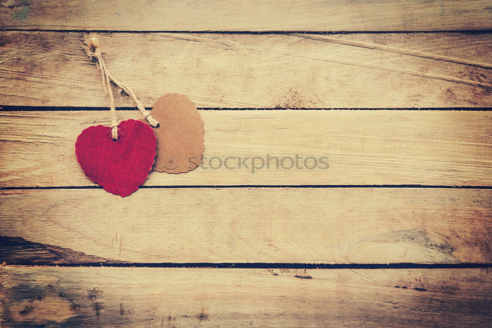 Similar – Image, Stock Photo Key to the heart especially: chain saw and door lock on wooden planks