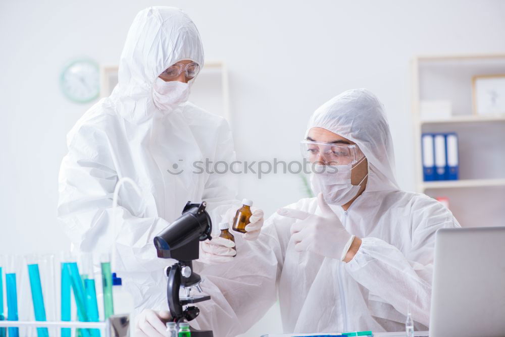 Similar – Image, Stock Photo Women standing and working in lab