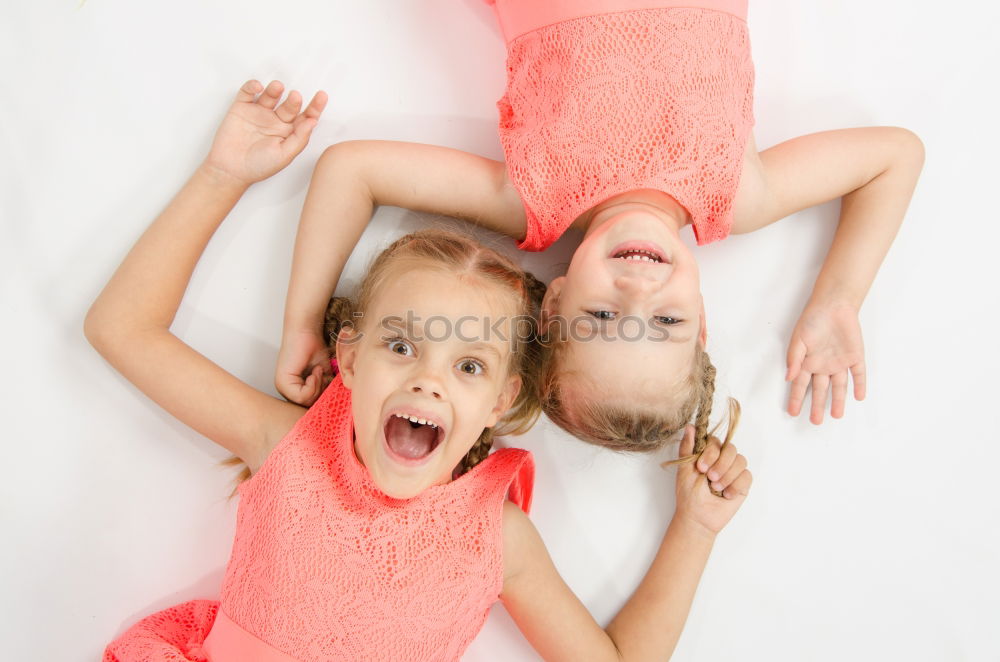 Similar – Image, Stock Photo Two beautiful sister kids playing under white sheets