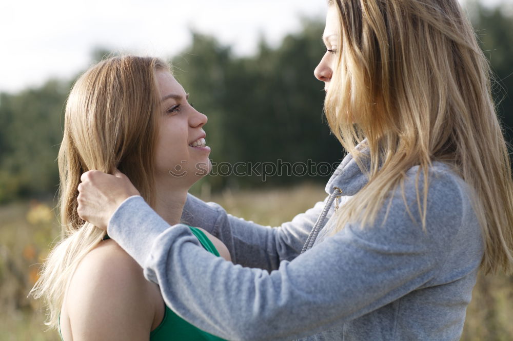 Similar – Image, Stock Photo Girls hugging at lake