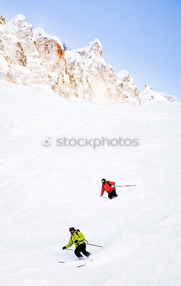 Image, Stock Photo Two skiers going downhill in powder snow