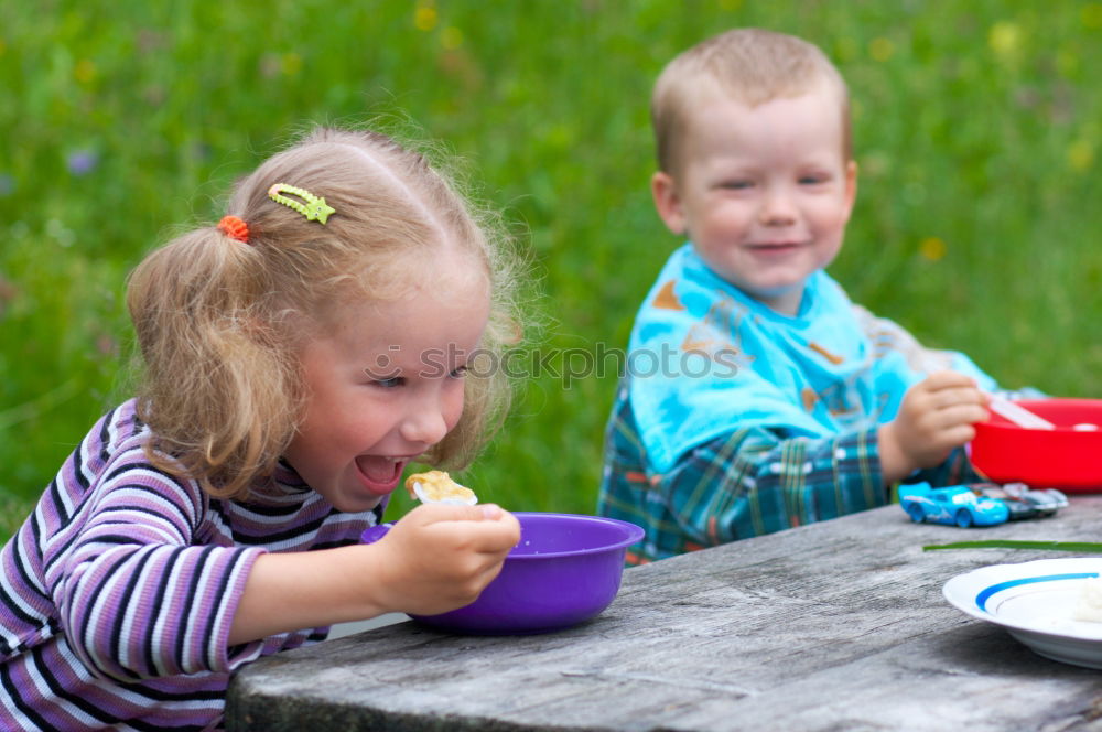 Similar – Image, Stock Photo Man and his little daughter having barbecue in forest on rocky shore of lake, making a fire, grilling bread, vegetables and marshmallow. Family exploring Finland. Scandinavian summer landscape.