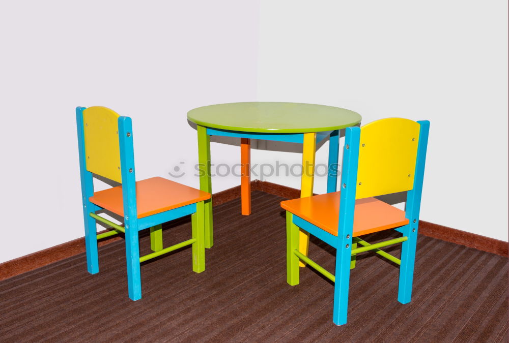 Similar – Street cafe with empty, colourful chairs and tables