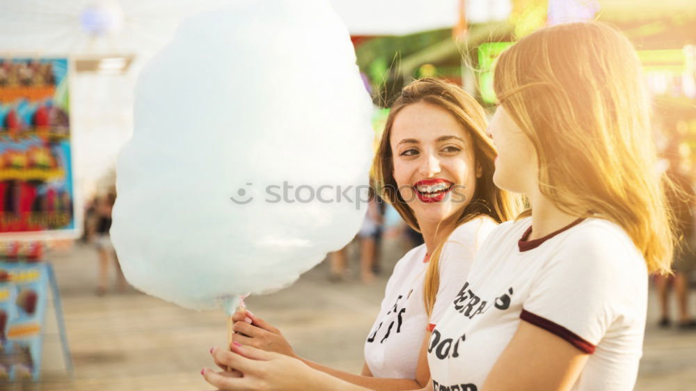 Similar – Image, Stock Photo Teenage girls having fun blowing bubbles together