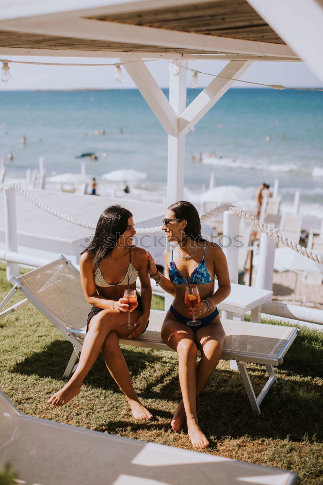 Similar – Caucasian Teenager girls enjoying ice cream on the beac