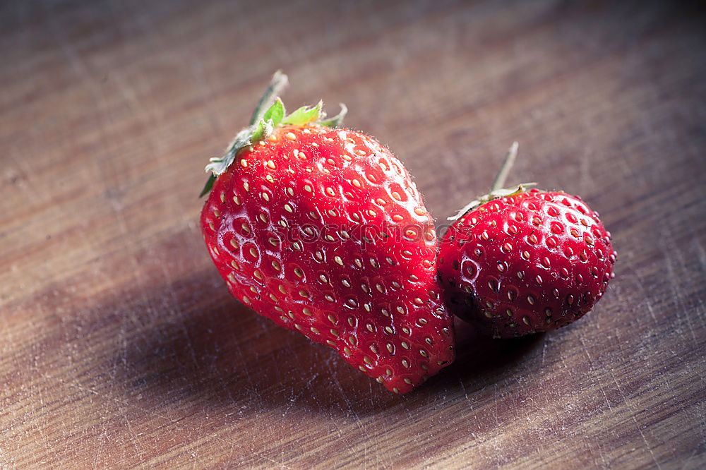 Similar – Bunch of red wild strawberry