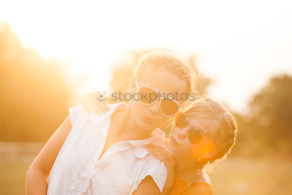 Similar – Image, Stock Photo Unrecognizable hugging couple in sunny street