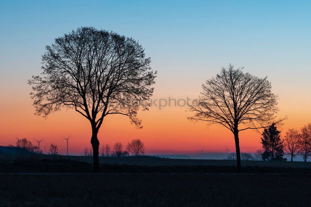 Similar – Red rising sun on top of an electric pole