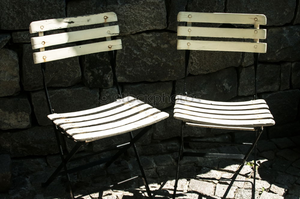 metallic chairs on the street