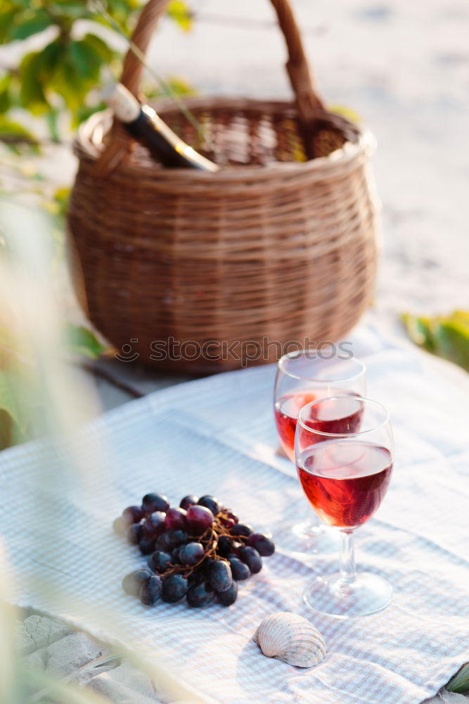 Image, Stock Photo Two wine glasses, wicker basket on beach