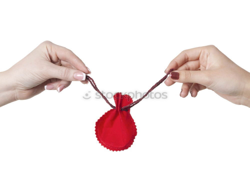 Similar – Hand holding Santa Claus toy