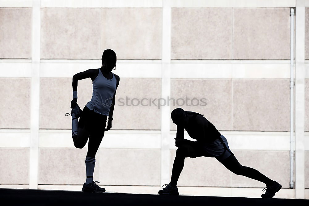 Similar – Young fit blonde woman running in the street