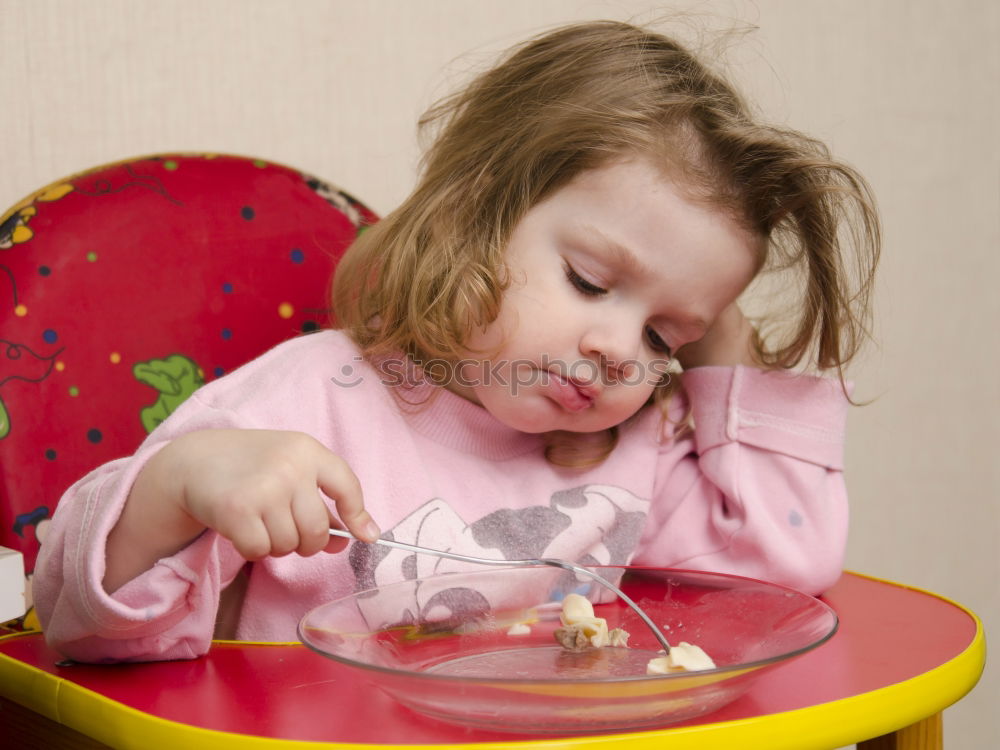 Similar – Girl decorating Christmas gingerbread cookies with chocolate