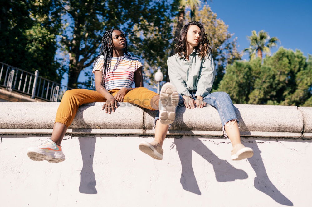 Similar – Image, Stock Photo Cheerful women standing on street together