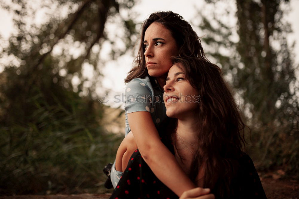 Similar – Women under umbrella in mountains