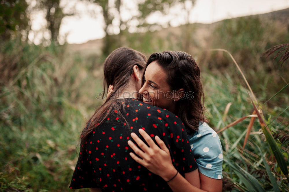 Similar – Image, Stock Photo Girls hugging at lake