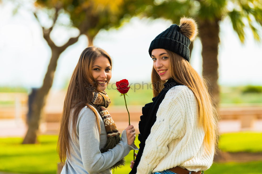 Similar – Image, Stock Photo Two girls sitting on the bench and smile