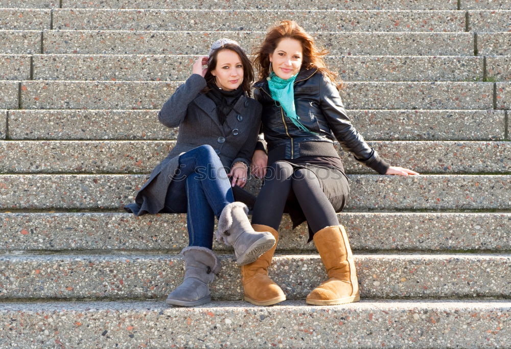 Image, Stock Photo Two young women looking at an smart phone outdoors