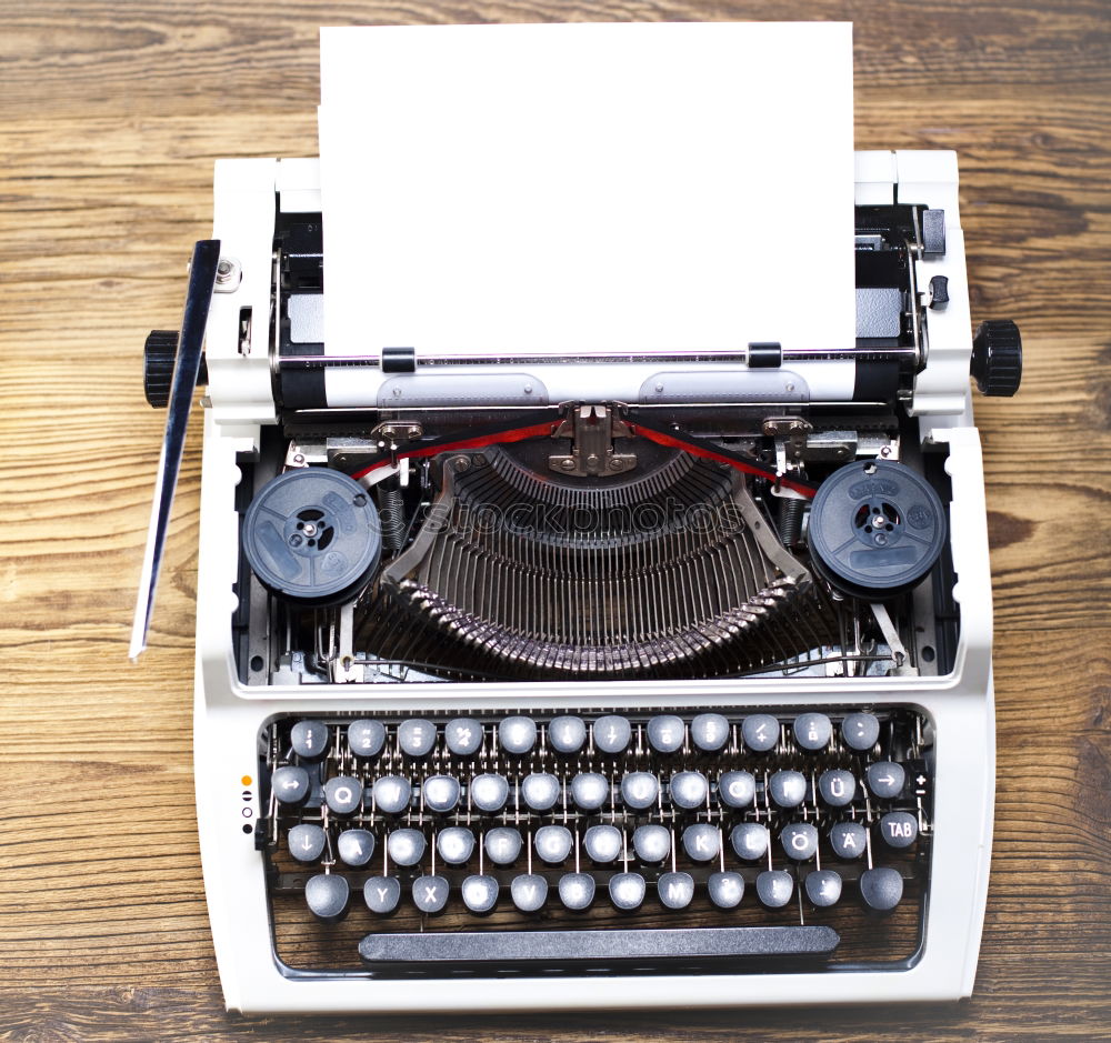 Similar – Text prescribed on a vintage typewriter and watch timekeeper.