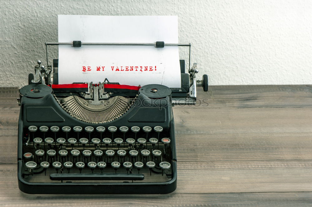 Similar – Red vintage typewriter with blank paper sheet on table