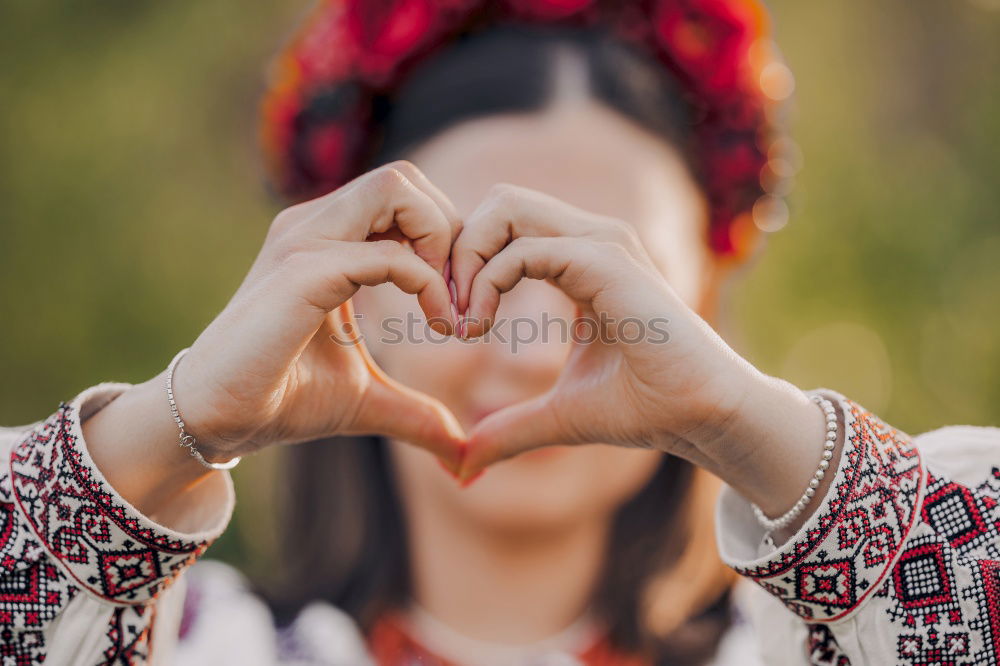 Similar – Image, Stock Photo Woman gesturing heart on street