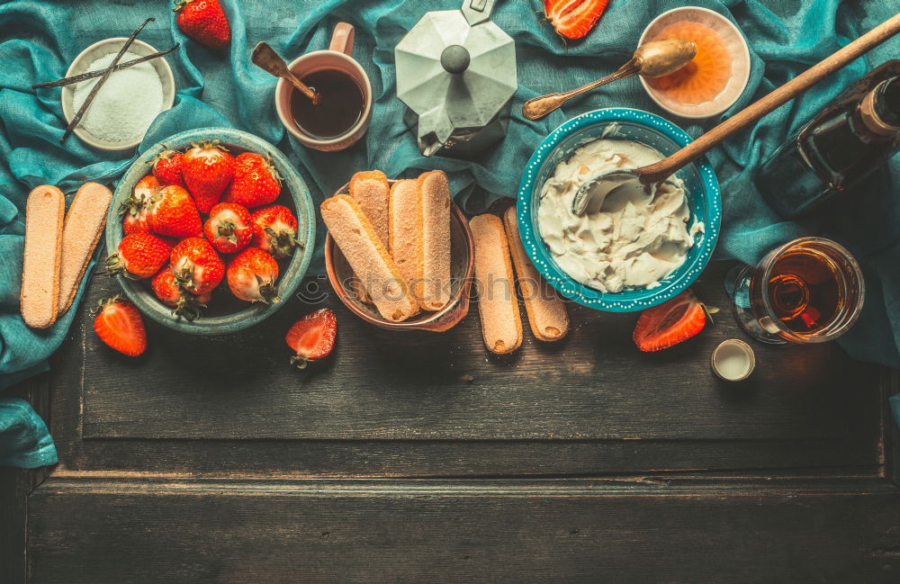 Similar – Image, Stock Photo Kitchen table with strawberries Tiramisu ingredients