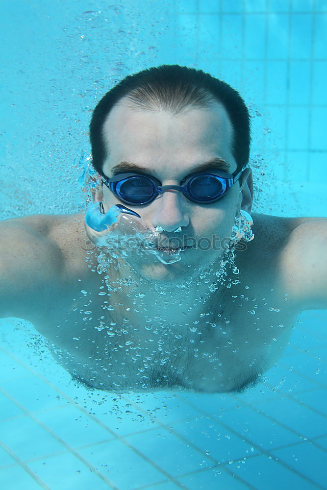 Similar – Young handsome man posing near a pool