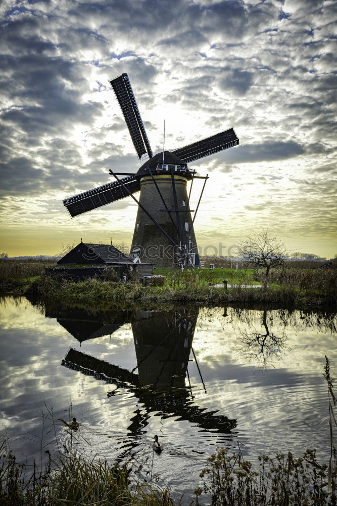 Similar – Image, Stock Photo charming windmill by lake at misty sunrise