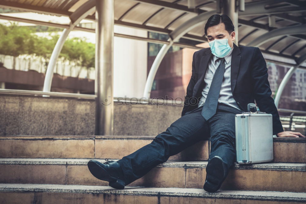 Image, Stock Photo Young business man sitting at the airport waiting for the flight