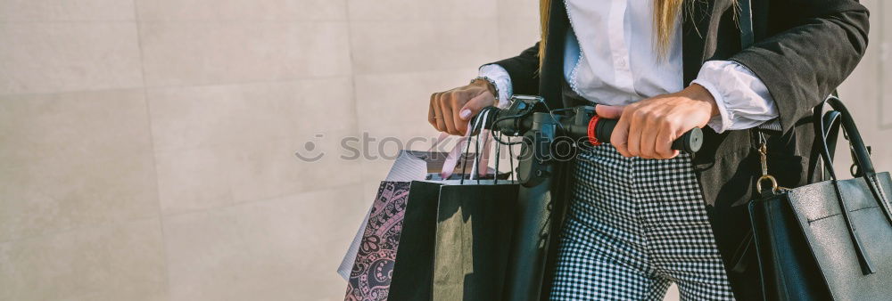 Similar – Thoughtful woman at lamp post