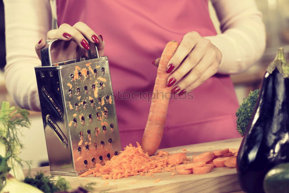 Similar – Girl tying baked Christmas gingerbread cookies with ribbon