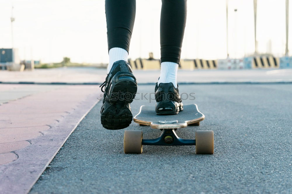 Similar – Image, Stock Photo Group of hipster friends longboarding on the road in summer