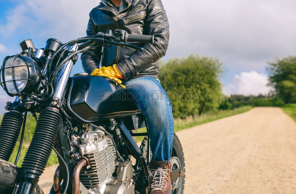 Man riding custom motorbike