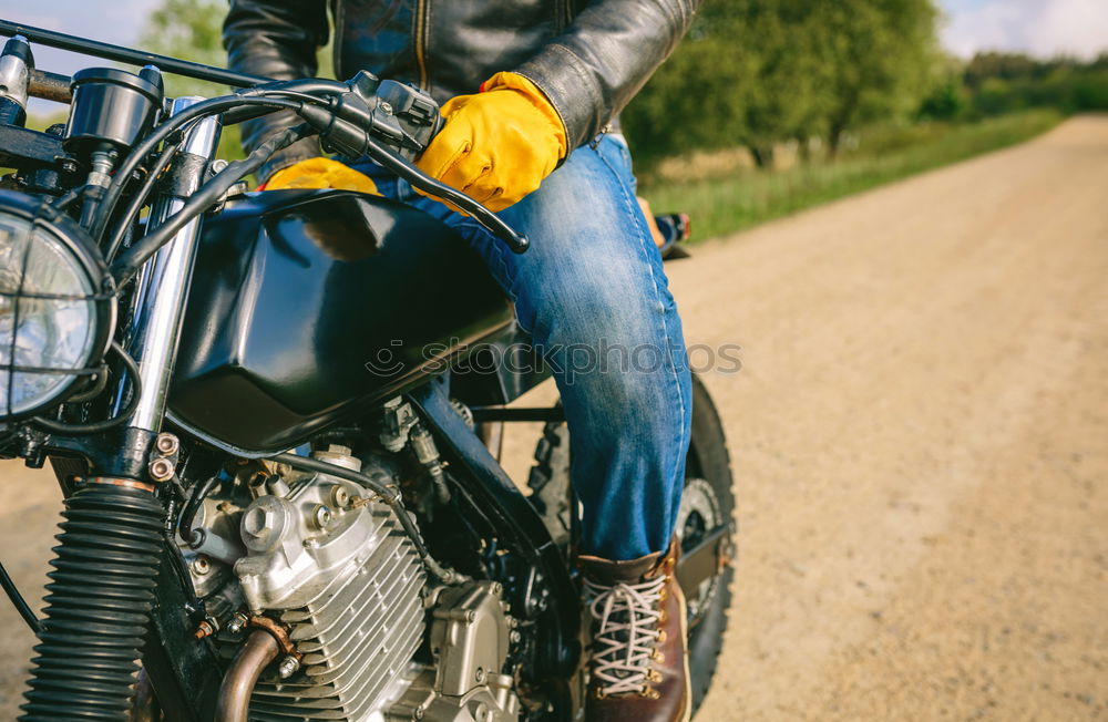 Similar – Man riding custom motorbike