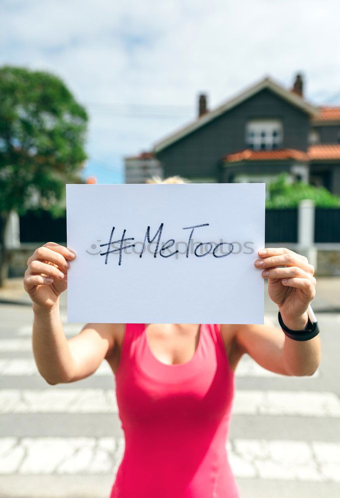 Similar – Image, Stock Photo young woman outdoors showing a notepad with the text me too