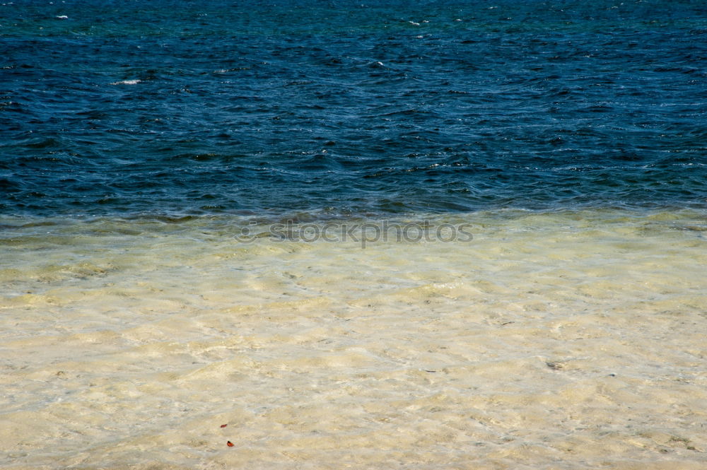 Similar – Image, Stock Photo Sand, sea and blue sky and dark clouds. At the beach of Fraser Island at the east coast of Queensland / Australia