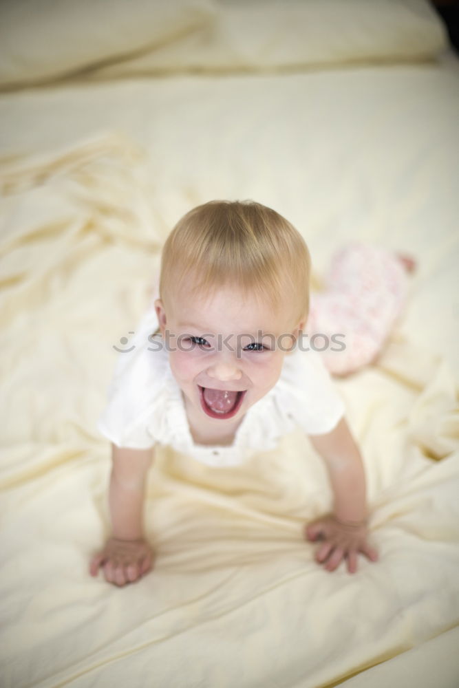 Similar – Image, Stock Photo portrait of a beautiful baby girl at home. Family concept indoor
