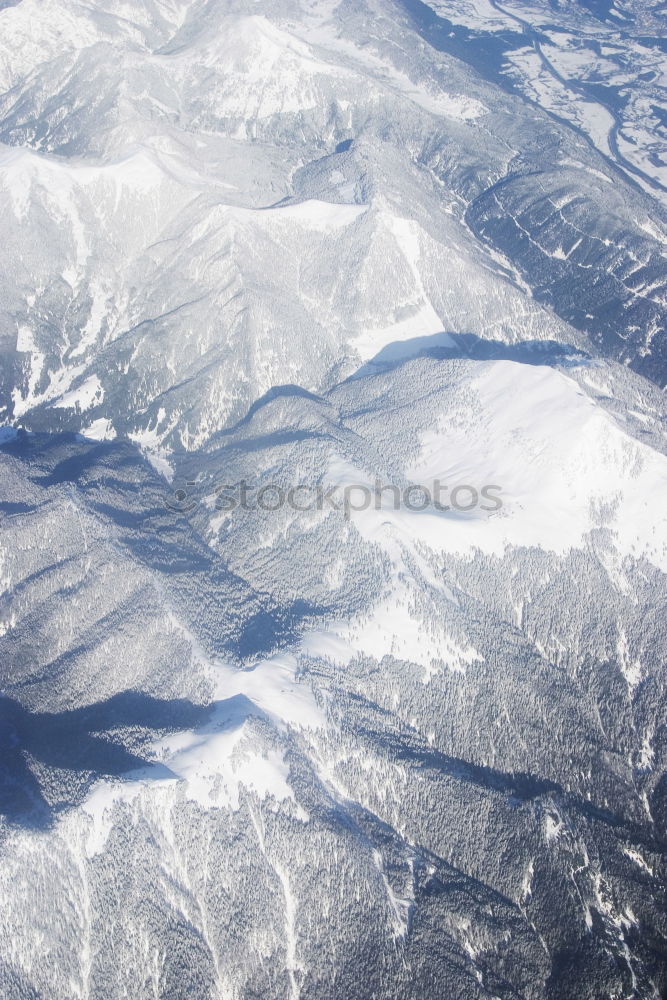 Similar – Mountain range in snow