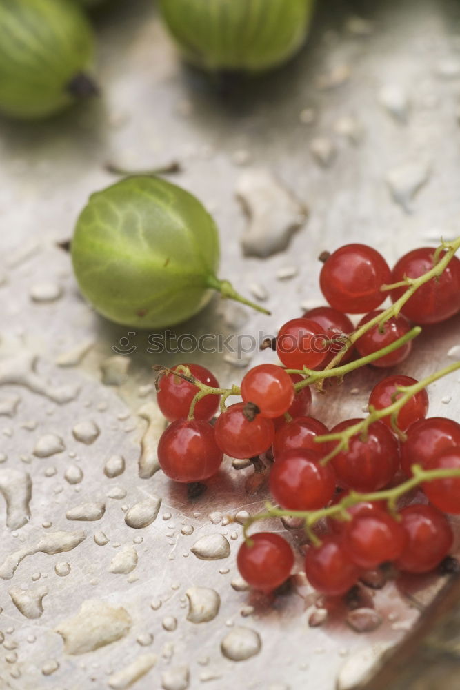 Similar – Image, Stock Photo Red grapes on an old wooden table close up