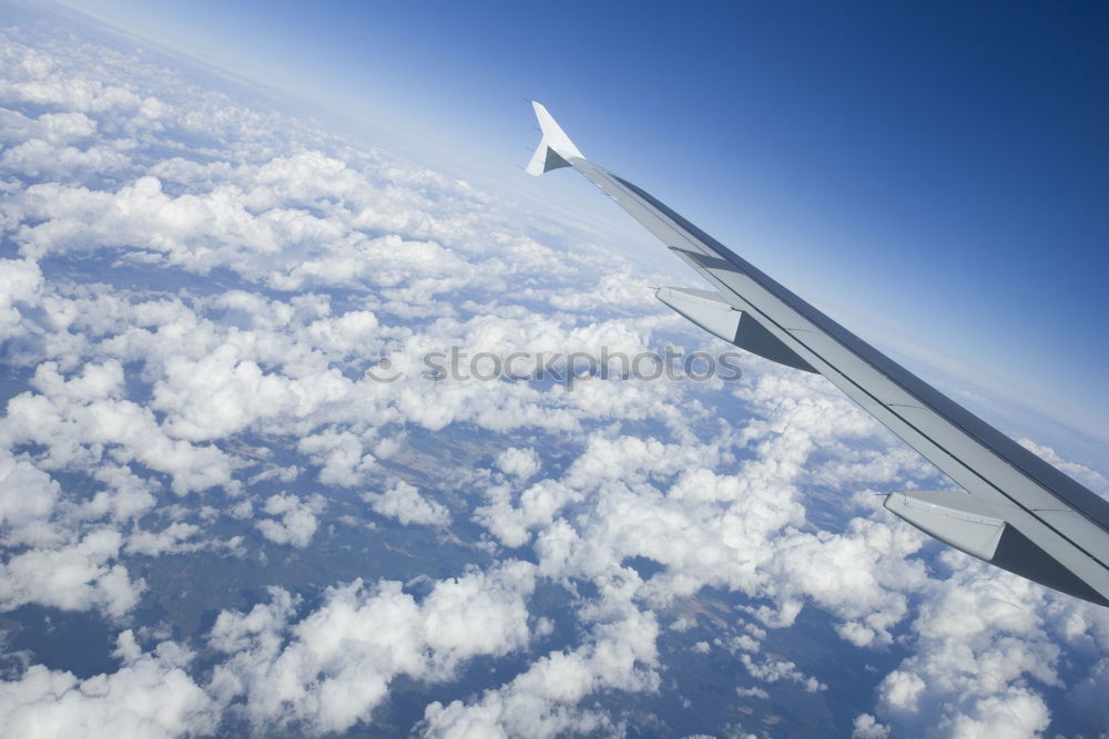 Similar – above the clouds Airplane