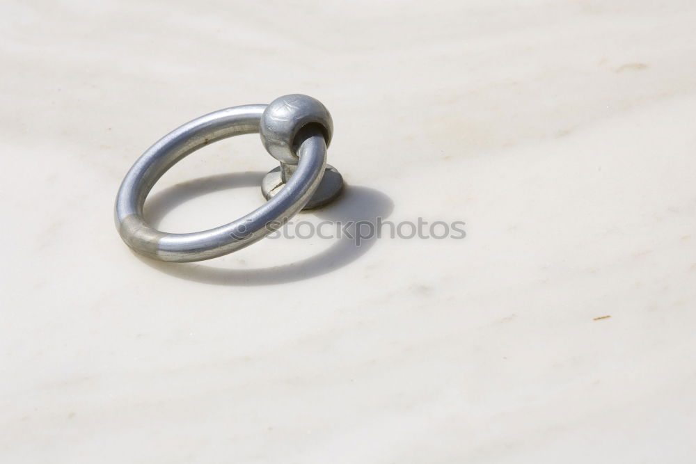 Similar – Ring with heart as shadow lies on paper